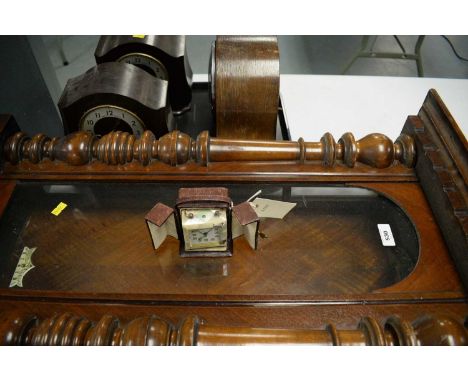 Two bakelite cased mantel clocks, by Smiths, Enfield; a mother-of-pearl panel-mounted travel clock, in leather case; an oak c
