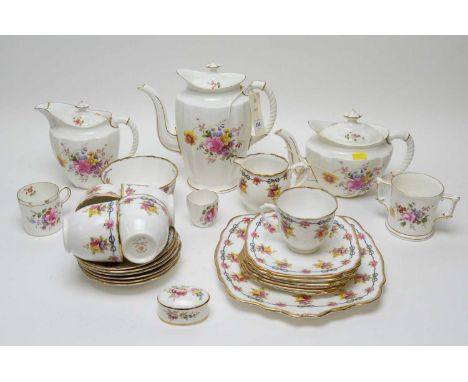 A part Royal Crown Derby floral tea and coffee service, comprising: teapot, coffee pot and cover, hot water jug and cover; to