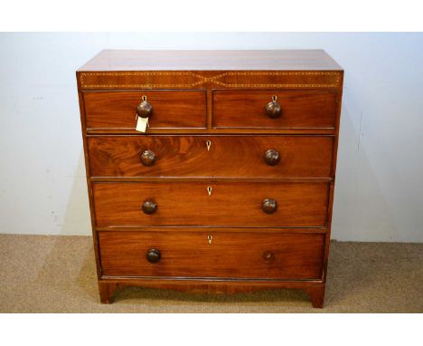 A Victorian mahogany chest of drawers, the caddy top above an arrangement of two short over three long graduated drawers, ivo