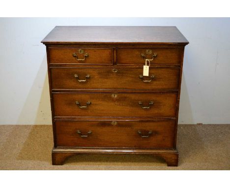 A 19th Century oak split chest of drawers, the rectangular top above an arrangement of two short drawers over three long grad