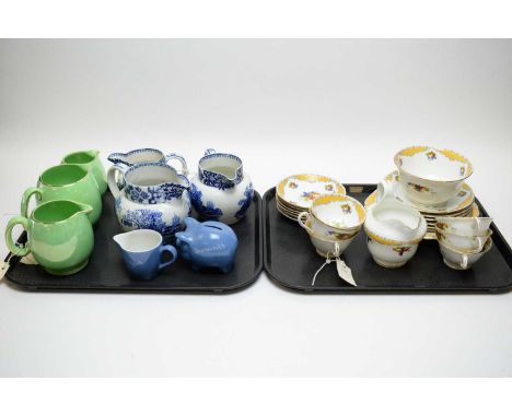 A Grosvenor china part fruit printed tea service; three blue and white 'Ming' jugs by T. &amp; G. Green &amp; Co; three gradu