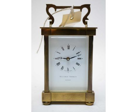 A modern brass-cased, brass panelled carriage clock, by Matthew Norman, London, with platform lever escapement.