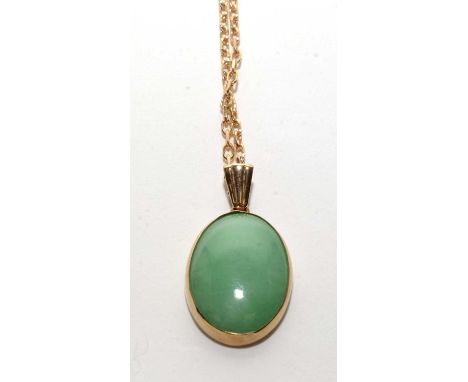 A jade pendant, the oval jade cabochon collet set in 9ct. mark, on a 9ct. gold cable link chain, pendant 2cms high, 5.6grms g