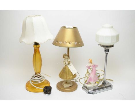 A chromed and earthenware bedroom lamp, in the Art Deco style, applied with a figure of a girl, white glass shade; another fi