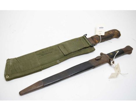 An 1888 pattern Lee Enfield rifle bayonet, the 30cm blade dated "98", with scabbard; together with a Martindale Military Issu