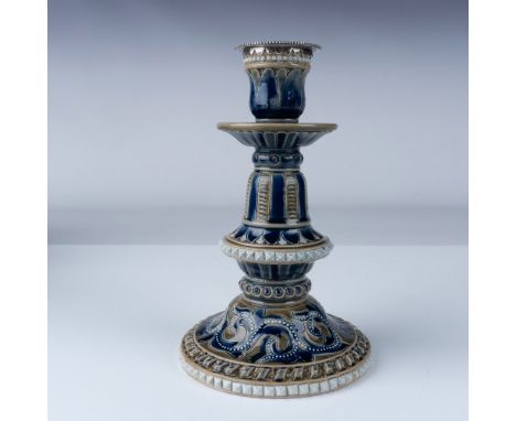A fine stoneware candlestick with an ornate sterling silver nozzle. This late 19th century piece, elegant Art Nouveau style c