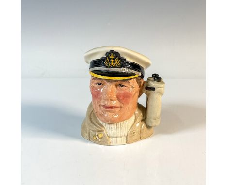 Style One, Variation One, without " R.C.N." on binoculars. White Royal Navy cap; light brown coat; white sweater. Royal Doult