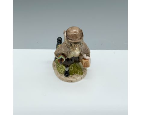 Glossy porcelain figure of a rodent wearing a brown jacket and hat. Royal Albert Beatrix Potter backstamp. This item has its 
