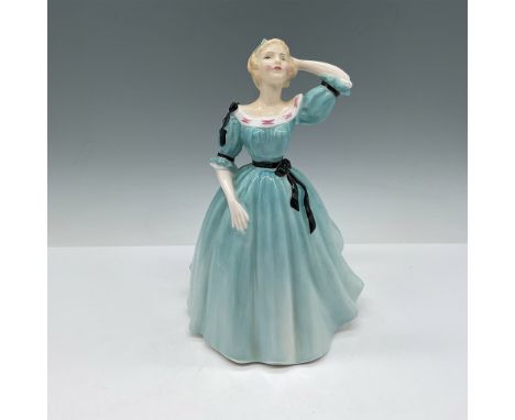 Part of the Peggy Davies Classic series, figure is wearing pale blue dress with black bows and sash. Royal Doulton backstamp.