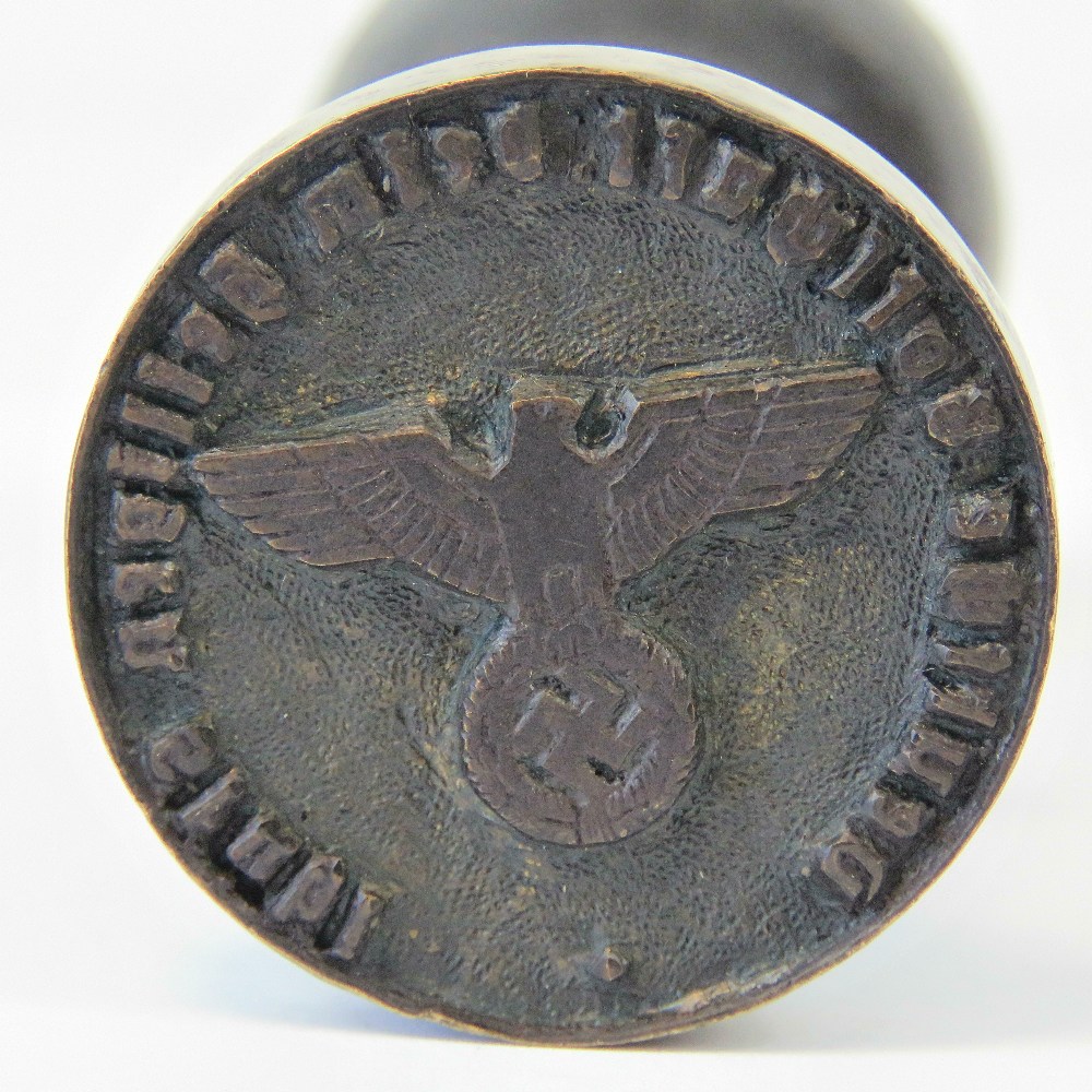 An original WWII German ink stamp, swastika with eagle and spread wings