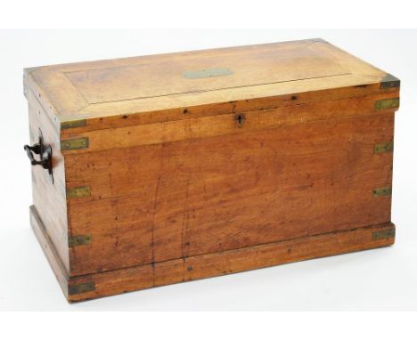 AN IRON AND BRASS MOUNTED HARDWOOD TRUNK, THE LID WITH BRASS PLAQUE INSCRIBED M SCAMTLEBURY, 52CM H; 98 X 54CM 