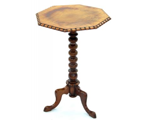 A VICTORIAN CARVED AND TURNED MAHOGANY OCTAGONAL TRIPOD TABLE, 74CM H