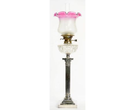 A PLATED BRASS CORINTHIAN COLUMN OIL LAMP ON STEPPED SQUARE FOOT WITH CUT GLASS FOUNT, MESSENGER PLATED BRASS BURNER AND LATE