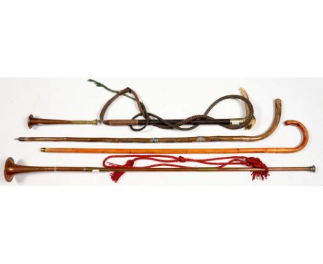 A COPPER AND BRASS HUNTING HORN, AN ANTLER HANDLED LEATHER WHIP, ANOTHER HORN AND TWO WALKING STICKS 
