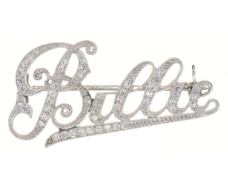 A DIAMOND PAVE SET NAME BROOCH, 'BILLIE', MILLEGRAIN EDGED, IN PLATINUM, UNMARKED, 4 CM LONG, 7G++IN GOOD CONDITION, WITH LIG