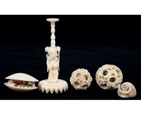 TWO CHINESE IVORY PUZZLE BALLS, A STAND, CLAMSHELL CARVING AND ANOTHER ITEM, LARGER BALL AND STAND 16CM H, 19TH C
