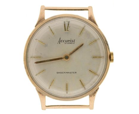 AN ACCURIST 9CT GOLD SHOCKMASTER GENTLEMAN'S WRISTWATCH, CASE 3.2 CM DIAMETER, 18.5G++IN WORKING CONDITION, SCRATCHES AND LIG
