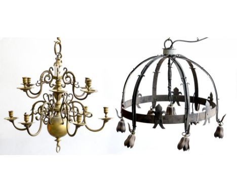 A VICTORIAN BRASS TWELVE BRANCH CHANDELIER AND A WROUGHT IRON CHANDELIER