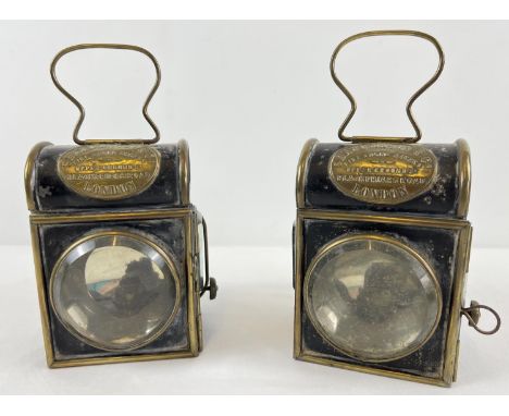 A pair of Shand Mason &amp; Co oil powered fire engine lamps. Dome topped lamps with square shaped bodies both housing oil re