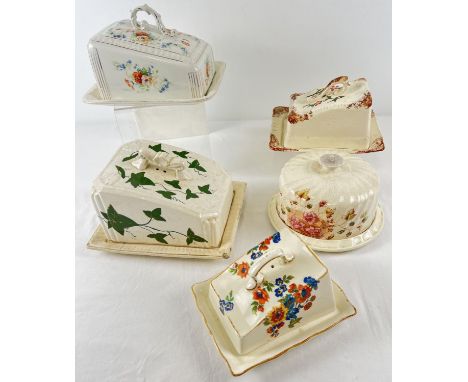 A collection of 5 assorted vintage ceramic lidded butter/cheese dishes. In varying conditions, sizes and designs. 