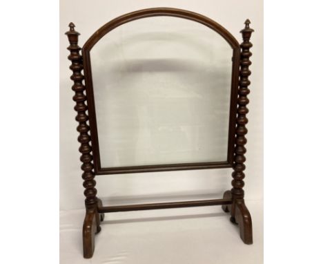 A Victorian glass panelled fire screen with chunky bobbin columns, turned finials &amp; original glass. Approx. 95cm tall x 7