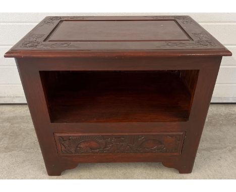 A vintage Chinese style unit with painted red mahogany effect and carved detail. Open shelf to front drawer underneath. Carve