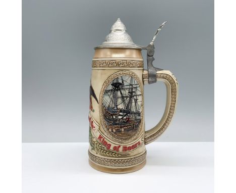 Adorned with illustrations of transportation via railroad and ships along with an eagle flying through the letter A on the ce