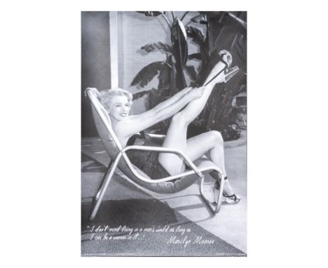 Large high quality black and white poster print on paper with matte finish. Features a seated Marilyn Monroe playfully tying 