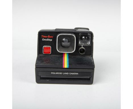 Features a black body with rainbow stripe down the middle. Instant film camera that uses Polaroid SX-70 film cartridges which