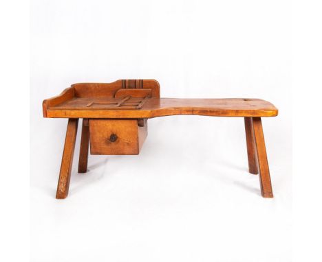 Well used colonial style maple cobblers bench with raised storage compartments, drawer and pegged joint leg construction. Iss