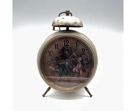 A German-made alarm clock featuring a charming Americana scene of musicians depicted on the face. An arm holding a drum stick