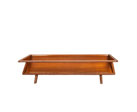 Unique solid wood library/magazine display designed coffee table with a slanted lower shelf. Issued: 20th centuryDimensions: 