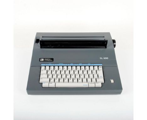 Vintage electric typewriter with original snap-on cover and manuals. Issued: 1988Dimensions: 16"L x 13.25"W x 5.75"HManufactu