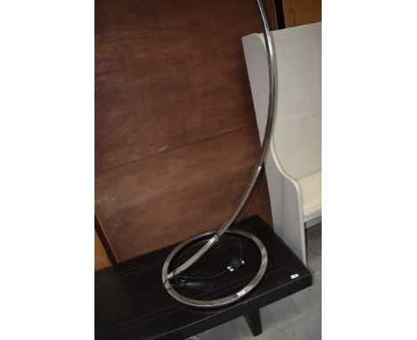 A modernist standard lamp in brushed chrome, height approx. 195cm