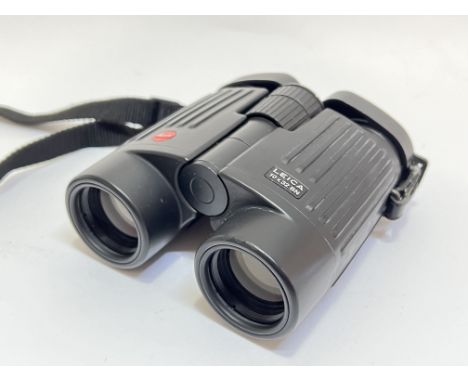 A pair of Leica (8X32) Trinovid Binoculars together with manual and original branded leather bag