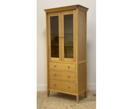 John Lewis, a contemporary light oak display cabinet / bookcase, fitted with two glazed doors opening to three adjustable she