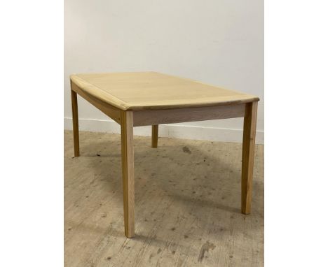 Ercol, a late 20th century / contemporary light oak extending dining table, with panelled top drawing out to reveal a leaf to