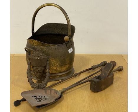 A 19th century planished brass coal scuttle with swing handle (H40cm) together with a matched set of fire side accessories (3