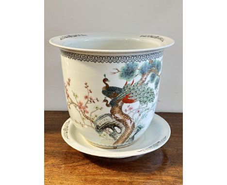 A modern Chinese porcelain planter with flared rim of tapered cylinder design with stand&nbsp; decorated with polychrome enam