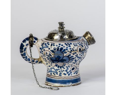 Antique teapot or jug in blue and white ceramic, with a finely detailed lid attached with a chain to the handle, Northern Eur