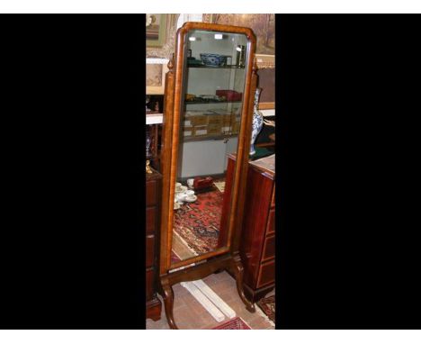 A walnut Cheval mirror 