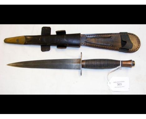A British Fairbairn Sykes commando dagger with 17.5cm blade and leather scabbard