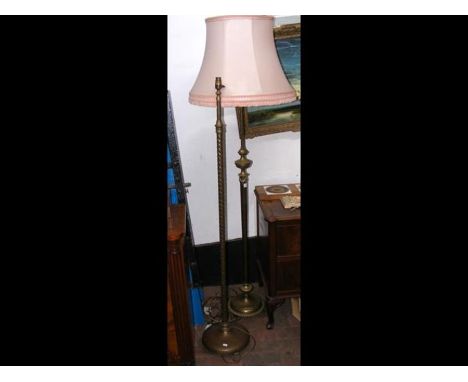 An antique adjustable brass standard lamp and one other 