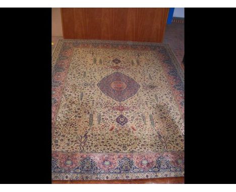 A large Middle Eastern style carpet with geometric border and centre medallion - 270cm x 220cmCONDITION REPORTneeds a clean a