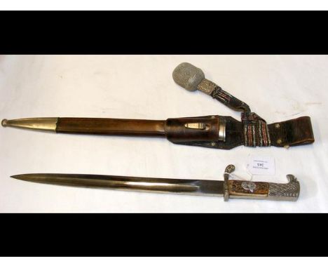 A WWII German Third Reich SD type parade dagger, scabbard, belt strap and tassel by Paul Eickhorn, SolingenCONDITION REPORTIn