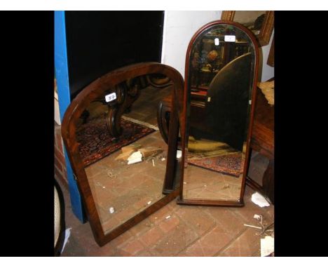 A bevelled hall mirror, together with one other 