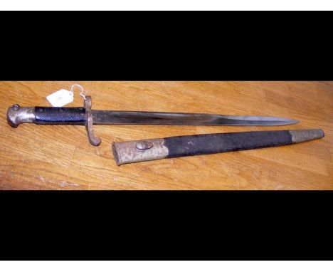 An antique sword bayonet with scabbard - 62cms long overall