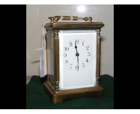 A 12cm high brass carriage clock