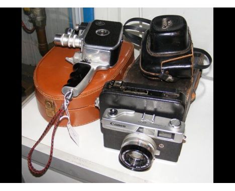 A vintage Canon Camera, Bolex Cine Camera, etc. 