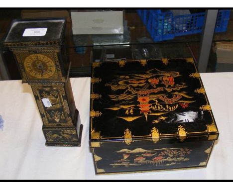 A 1929 Huntley &amp; Palmers 'Grandfather Clock' biscuit tin, with moving hands to clock face, together with a 1961 Huntley &